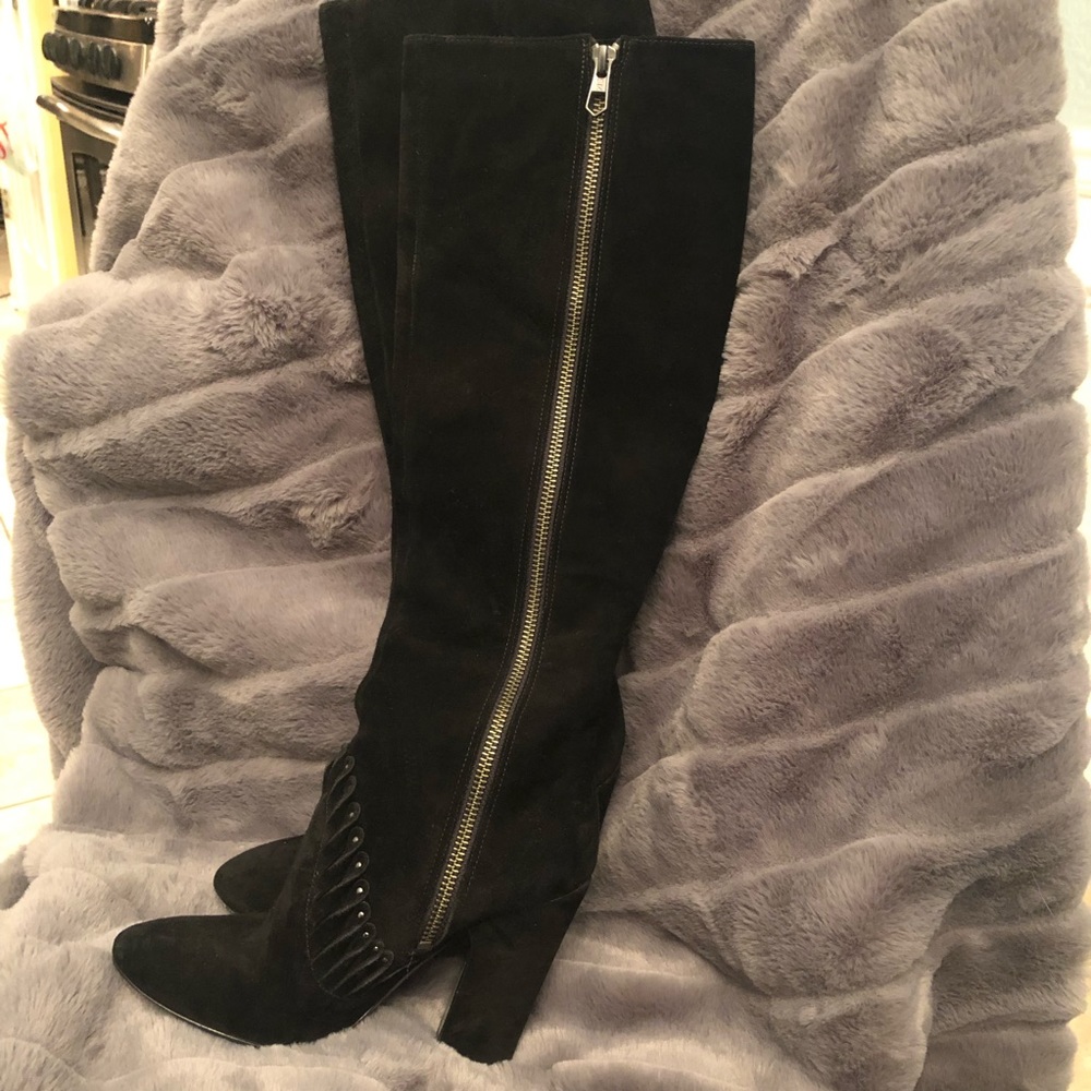 Zip up boots to below the knee. Made in Italy